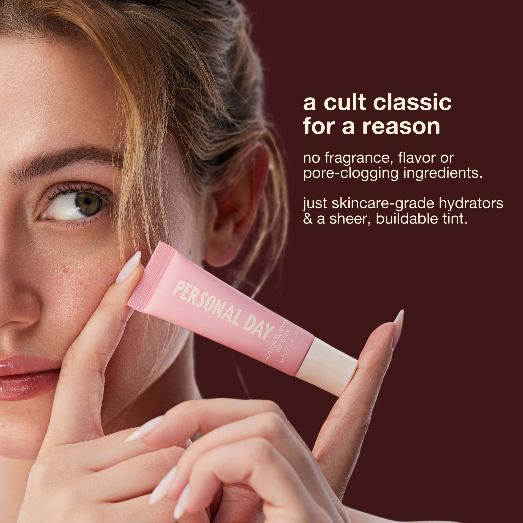 Woman holding a pink lip balm with text about its ingredients on a dark background